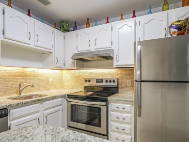 Impeccable first floor 1BR with washer and dryer in the on Vero Beach South Golf Course in Florida - for sale on GolfHomes.com, golf home, golf lot