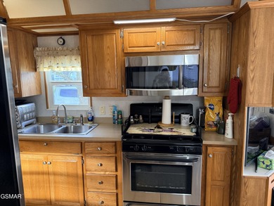 AMAZINGLY beautiful CREEK lot with a 2010 Heritage Park Model! on Bent Creek Golf Course in Tennessee - for sale on GolfHomes.com, golf home, golf lot