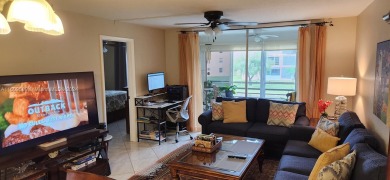 Updated 2 bed 2 bath in Sunrise Lakes Solid Wood Cherry Shaker on Sunrise Lakes Phase III in Florida - for sale on GolfHomes.com, golf home, golf lot