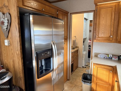 AMAZINGLY beautiful CREEK lot with a 2010 Heritage Park Model! on Bent Creek Golf Course in Tennessee - for sale on GolfHomes.com, golf home, golf lot