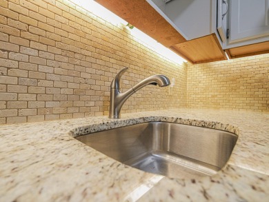 Impeccable first floor 1BR with washer and dryer in the on Vero Beach South Golf Course in Florida - for sale on GolfHomes.com, golf home, golf lot