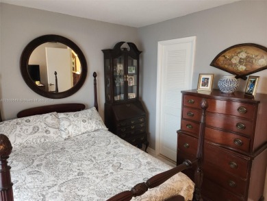 Updated 2 bed 2 bath in Sunrise Lakes Solid Wood Cherry Shaker on Sunrise Lakes Phase III in Florida - for sale on GolfHomes.com, golf home, golf lot