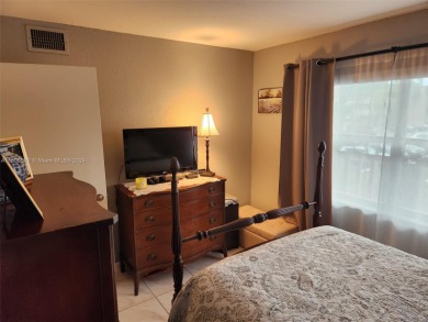 Updated 2 bed 2 bath in Sunrise Lakes Solid Wood Cherry Shaker on Sunrise Lakes Phase III in Florida - for sale on GolfHomes.com, golf home, golf lot