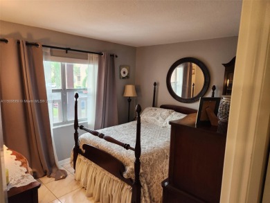 Updated 2 bed 2 bath in Sunrise Lakes Solid Wood Cherry Shaker on Sunrise Lakes Phase III in Florida - for sale on GolfHomes.com, golf home, golf lot