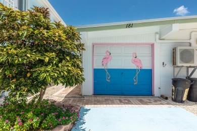 Beautiful 2 bedroom, 2 bath canal front half duplex in the on Key Colony Beach Golf Course in Florida - for sale on GolfHomes.com, golf home, golf lot