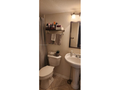 Updated 2 bed 2 bath in Sunrise Lakes Solid Wood Cherry Shaker on Sunrise Lakes Phase III in Florida - for sale on GolfHomes.com, golf home, golf lot