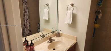 Updated 2 bed 2 bath in Sunrise Lakes Solid Wood Cherry Shaker on Sunrise Lakes Phase III in Florida - for sale on GolfHomes.com, golf home, golf lot
