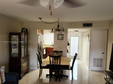 Updated 2 bed 2 bath in Sunrise Lakes Solid Wood Cherry Shaker on Sunrise Lakes Phase III in Florida - for sale on GolfHomes.com, golf home, golf lot