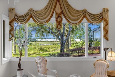 Luxurious lakeside living beckons you to your own private on Deer Island Country Club in Florida - for sale on GolfHomes.com, golf home, golf lot