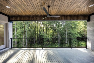 This contemporary home is brimming with amenities, featuring on Chenal Country Club - Bear Den Mountain in Arkansas - for sale on GolfHomes.com, golf home, golf lot