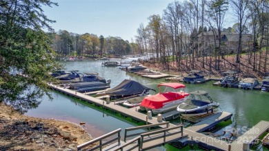 Nestled in the highly sought-after The Point, this stunning on Trump National Golf Club Charlotte in North Carolina - for sale on GolfHomes.com, golf home, golf lot