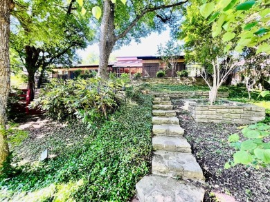 SO MUCH CHARACTER! Located in the coveted and quiet Country Club on Grand Oaks Golf Club in Texas - for sale on GolfHomes.com, golf home, golf lot