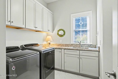 Exquisite Low Country Estate with Tee-to-Hole Golf Course & Pond on Ocean Ridge Plantation in North Carolina - for sale on GolfHomes.com, golf home, golf lot