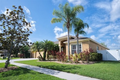 Stunning 4-Bedroom Pool Home with Office  Bonus Room in Gated on Heritage Isles Golf and Country Club in Florida - for sale on GolfHomes.com, golf home, golf lot
