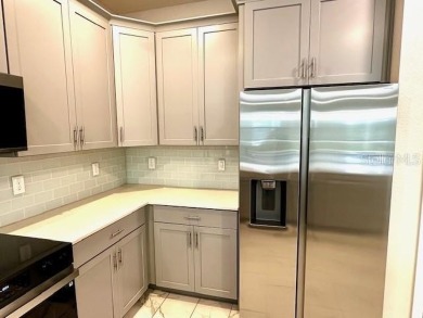 This spacious 8-bedroom, 5-bathroom home in a gated community on The Oasis Club at Champions Gate in Florida - for sale on GolfHomes.com, golf home, golf lot