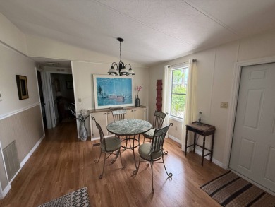 This well-cared for 2-bedroom, 2-bathroom home is being sold on Del Tura Golf and Country Club in Florida - for sale on GolfHomes.com, golf home, golf lot