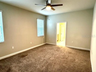 This spacious 8-bedroom, 5-bathroom home in a gated community on The Oasis Club at Champions Gate in Florida - for sale on GolfHomes.com, golf home, golf lot