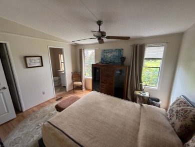 This well-cared for 2-bedroom, 2-bathroom home is being sold on Del Tura Golf and Country Club in Florida - for sale on GolfHomes.com, golf home, golf lot