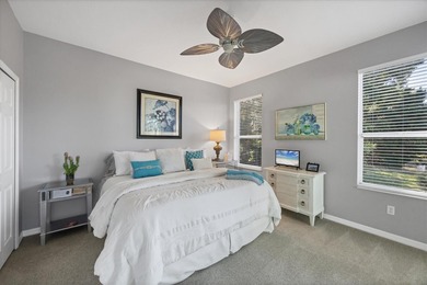 A captivating lake view with mature trees draws you in the on Legacy Golf Club in Florida - for sale on GolfHomes.com, golf home, golf lot