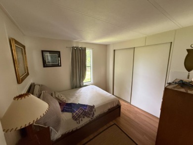 This well-cared for 2-bedroom, 2-bathroom home is being sold on Del Tura Golf and Country Club in Florida - for sale on GolfHomes.com, golf home, golf lot