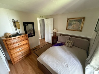 This well-cared for 2-bedroom, 2-bathroom home is being sold on Del Tura Golf and Country Club in Florida - for sale on GolfHomes.com, golf home, golf lot