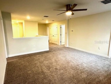 This spacious 8-bedroom, 5-bathroom home in a gated community on The Oasis Club at Champions Gate in Florida - for sale on GolfHomes.com, golf home, golf lot