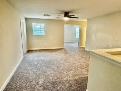 This spacious 8-bedroom, 5-bathroom home in a gated community on The Oasis Club at Champions Gate in Florida - for sale on GolfHomes.com, golf home, golf lot