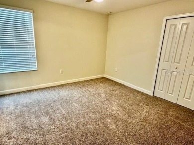 This spacious 8-bedroom, 5-bathroom home in a gated community on The Oasis Club at Champions Gate in Florida - for sale on GolfHomes.com, golf home, golf lot