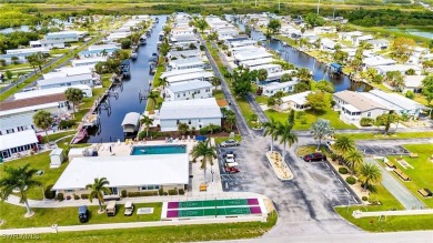 WATERFRONT LIVING AT ITS BEST! Land ownership-no lot rent! Don't on Live Oak Golf Club and RV Park in Florida - for sale on GolfHomes.com, golf home, golf lot