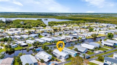 WATERFRONT LIVING AT ITS BEST! Land ownership-no lot rent! Don't on Live Oak Golf Club and RV Park in Florida - for sale on GolfHomes.com, golf home, golf lot