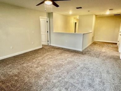 This spacious 8-bedroom, 5-bathroom home in a gated community on The Oasis Club at Champions Gate in Florida - for sale on GolfHomes.com, golf home, golf lot