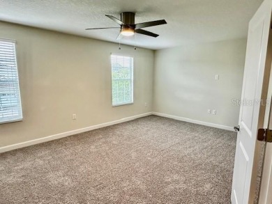 This spacious 8-bedroom, 5-bathroom home in a gated community on The Oasis Club at Champions Gate in Florida - for sale on GolfHomes.com, golf home, golf lot