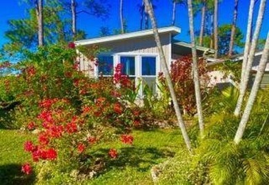 This well-cared for 2-bedroom, 2-bathroom home is being sold on Del Tura Golf and Country Club in Florida - for sale on GolfHomes.com, golf home, golf lot