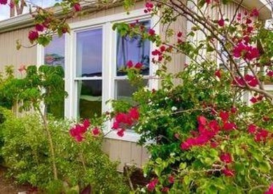 This well-cared for 2-bedroom, 2-bathroom home is being sold on Del Tura Golf and Country Club in Florida - for sale on GolfHomes.com, golf home, golf lot