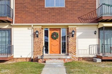 This upper-floor 2-bedroom condo offers beautiful views of the on Marysville Golf Course in Michigan - for sale on GolfHomes.com, golf home, golf lot