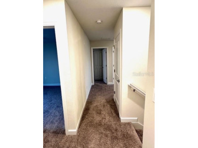This spacious 8-bedroom, 5-bathroom home in a gated community on The Oasis Club at Champions Gate in Florida - for sale on GolfHomes.com, golf home, golf lot