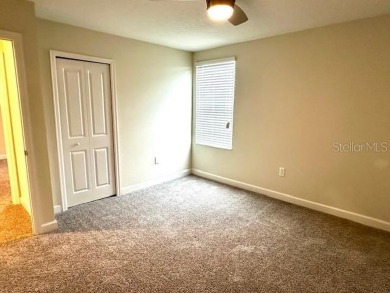 This spacious 8-bedroom, 5-bathroom home in a gated community on The Oasis Club at Champions Gate in Florida - for sale on GolfHomes.com, golf home, golf lot