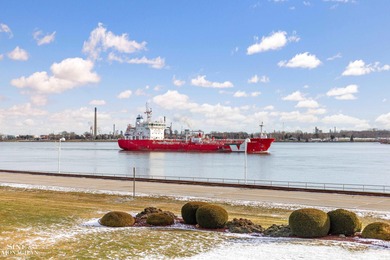 This upper-floor 2-bedroom condo offers beautiful views of the on Marysville Golf Course in Michigan - for sale on GolfHomes.com, golf home, golf lot