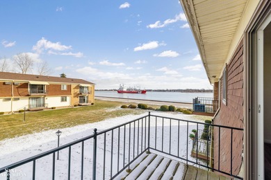 This upper-floor 2-bedroom condo offers beautiful views of the on Marysville Golf Course in Michigan - for sale on GolfHomes.com, golf home, golf lot