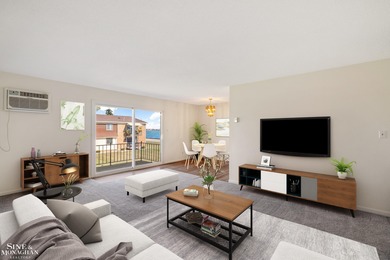 This upper-floor 2-bedroom condo offers beautiful views of the on Marysville Golf Course in Michigan - for sale on GolfHomes.com, golf home, golf lot