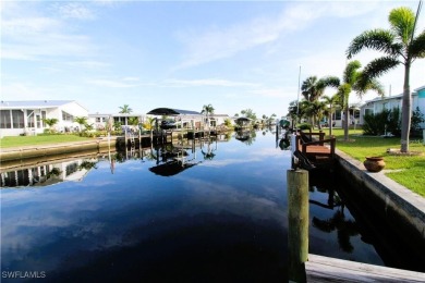 WATERFRONT LIVING AT ITS BEST! Land ownership-no lot rent! Don't on Live Oak Golf Club and RV Park in Florida - for sale on GolfHomes.com, golf home, golf lot