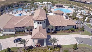 This spacious 8-bedroom, 5-bathroom home in a gated community on The Oasis Club at Champions Gate in Florida - for sale on GolfHomes.com, golf home, golf lot