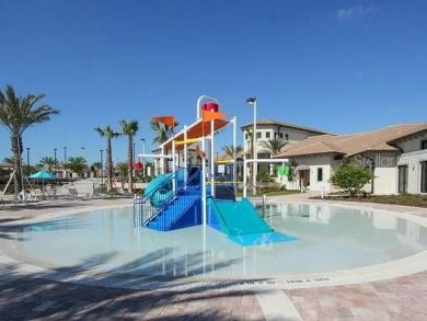 This spacious 8-bedroom, 5-bathroom home in a gated community on The Oasis Club at Champions Gate in Florida - for sale on GolfHomes.com, golf home, golf lot