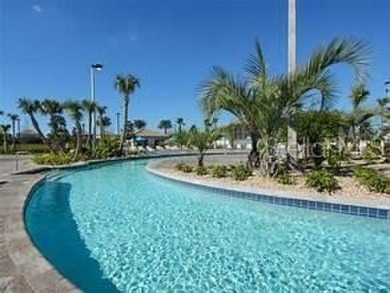 This spacious 8-bedroom, 5-bathroom home in a gated community on The Oasis Club at Champions Gate in Florida - for sale on GolfHomes.com, golf home, golf lot