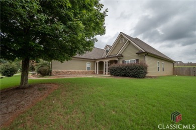 Located in desirable Magnolia Pointe neighborhood, 210 Sawtooth on Traditions of Braselton Golf Club in Georgia - for sale on GolfHomes.com, golf home, golf lot