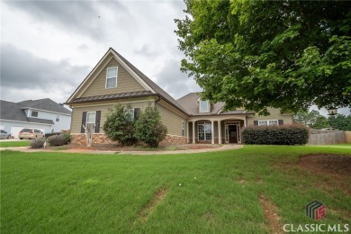 Located in desirable Magnolia Pointe neighborhood, 210 Sawtooth on Traditions of Braselton Golf Club in Georgia - for sale on GolfHomes.com, golf home, golf lot