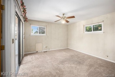 Situated at the end of a quiet cul-de-sac, this well-maintained on St. Clair Shores Country Club in Michigan - for sale on GolfHomes.com, golf home, golf lot