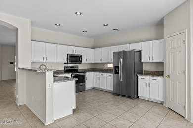 Nestled just off the 14th hole of the Las Colinas Golf Course on Las Colinas Golf Club in Arizona - for sale on GolfHomes.com, golf home, golf lot