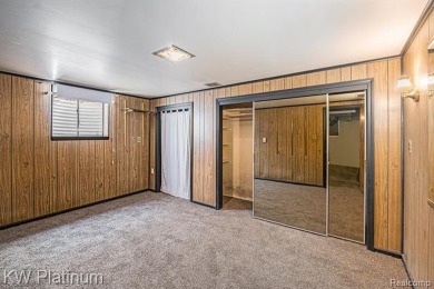 Situated at the end of a quiet cul-de-sac, this well-maintained on St. Clair Shores Country Club in Michigan - for sale on GolfHomes.com, golf home, golf lot