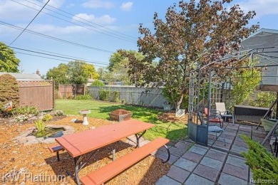 Situated at the end of a quiet cul-de-sac, this well-maintained on St. Clair Shores Country Club in Michigan - for sale on GolfHomes.com, golf home, golf lot